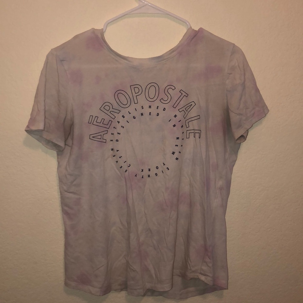 White with faded purple and blue accent